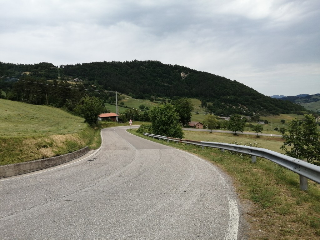 Descending on a smooth paved road from Passo del Carnaio.